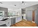 Open kitchen design with a view of the living room and backyard at 13640 2Nd E Ave, Bradenton, FL 34212