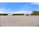 Sandy beach area with waterfront views and clear blue skies perfect for enjoying coastal living at 1404 Dartmouth Dr, Bradenton, FL 34207