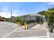 Exterior view of the office with a ramp, parking, and a manicured landscape at 1404 Dartmouth Dr, Bradenton, FL 34207