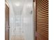 Hallway with doors on either side of it at 1404 Dartmouth Dr, Bradenton, FL 34207