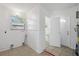 Practical laundry area with washer hookups, utility sink, and back door access to the property at 1404 Dartmouth Dr, Bradenton, FL 34207