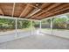 Screened-in patio with tile flooring, perfect for outdoor living at 1404 Dartmouth Dr, Bradenton, FL 34207