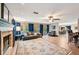 Expansive living room featuring hardwood floors, fireplace, and open floor plan at 1509 Shadow Ridge Cir, Sarasota, FL 34240