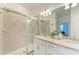 Beautiful bathroom with double vanity, granite countertop and updated walk-in shower at 15164 Sunny Day Dr, Bradenton, FL 34211