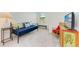 Bedroom with a daybed, accent pillows, and a bright window view at 15164 Sunny Day Dr, Bradenton, FL 34211