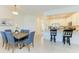 Open-concept dining area adjacent to kitchen and living room, perfect for entertaining at 15164 Sunny Day Dr, Bradenton, FL 34211