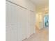 Hallway with a closet and easy access to other parts of the home at 15164 Sunny Day Dr, Bradenton, FL 34211