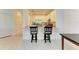 Open kitchen with breakfast bar and stainless steel appliances at 15164 Sunny Day Dr, Bradenton, FL 34211