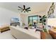 Comfortable living area with sliding glass doors to the lanai at 15164 Sunny Day Dr, Bradenton, FL 34211