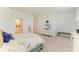 Spacious main bedroom with neutral carpet, white walls, and ensuite bathroom at 15164 Sunny Day Dr, Bradenton, FL 34211