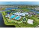 A birds eye view of a the community's facilities, including a clubhouse, pools, and sport courts at 15225 Lyla Ter, Bradenton, FL 34211