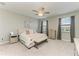 Serene bedroom with soft carpet, neutral walls, and a comfortable queen-sized bed at 15225 Lyla Ter, Bradenton, FL 34211