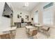 Cozy coffee bar area with stylish seating, a modern coffee machine, and elegant wall decor at 15225 Lyla Ter, Bradenton, FL 34211