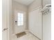 Inviting entryway with a stylish front door, coat closet, welcome mat, and coat rack at 15225 Lyla Ter, Bradenton, FL 34211
