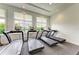 Well-equipped gym featuring modern treadmills with scenic views from the windows at 15225 Lyla Ter, Bradenton, FL 34211