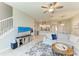 Bright and airy living room with a TV, comfortable seating, and an open layout at 15225 Lyla Ter, Bradenton, FL 34211