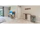 Well-lit living room with light tile flooring, stylish furnishings, and modern decor at 15225 Lyla Ter, Bradenton, FL 34211