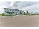 Spacious parking lot with clearly marked accessible parking spots in front of a well-maintained building at 15225 Lyla Ter, Bradenton, FL 34211