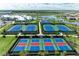 A collection of community tennis and basketball courts, along with green spaces and facilities at 15225 Lyla Ter, Bradenton, FL 34211