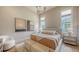 Bright bedroom featuring recessed lighting, two windows, neutral tones, and two abstract art pieces at 15315 Anchorage Pl, Lakewood Ranch, FL 34202
