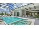 The indoor-outdoor flow of this home leads to a screened lanai and an inviting pool and spa at 15315 Anchorage Pl, Lakewood Ranch, FL 34202