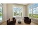 A sun-filled seating area offers pool views through large windows at 15315 Anchorage Pl, Lakewood Ranch, FL 34202