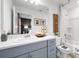 Well-lit bathroom with a double sink vanity, ample counter space, and a shower-tub combination at 16538 San Nicola Pl, Bradenton, FL 34211
