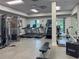 Fitness center features treadmills, exercise equipment, and natural light through large windows at 17110 Verona Pl, Bradenton, FL 34202