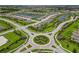 Aerial view of a residential community showcasing well-maintained homes and landscaping at 17209 Barnwood Pl, Bradenton, FL 34211