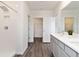 Spacious bathroom with a large double vanity, walk-in shower, and ample storage at 17209 Barnwood Pl, Bradenton, FL 34211
