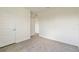 Neutral bedroom has plush carpeting, fresh paint, and a large window allowing natural light at 17209 Barnwood Pl, Bradenton, FL 34211