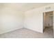 Neutral bedroom has plush carpeting, fresh paint, and a large window allowing natural light at 17209 Barnwood Pl, Bradenton, FL 34211