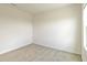 Neutral bedroom has plush carpeting, fresh paint, and a large window allowing natural light at 17209 Barnwood Pl, Bradenton, FL 34211