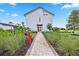 Modern two-story building featuring attractive landscaping and welcoming entrance at 17209 Barnwood Pl, Bradenton, FL 34211