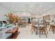 Stylish lounge featuring tables, chairs, couches, and a coffee bar in a spacious, well-lit area at 17209 Barnwood Pl, Bradenton, FL 34211
