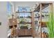 Retail section with shelves displaying merchandise, including local products and snacks, in a sunny space at 17209 Barnwood Pl, Bradenton, FL 34211