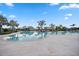 Resort-style pool surrounded by lush tropical landscaping at 17209 Barnwood Pl, Bradenton, FL 34211