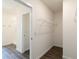 Walk-in closet includes wood-look flooring and white wire shelving for optimal storage space at 17209 Barnwood Pl, Bradenton, FL 34211