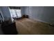Large bedroom with carpet, a window, and dressers at 17215 Berwin Ave, Port Charlotte, FL 33948