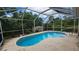 Inviting screened-in pool offering a private outdoor retreat at 17215 Berwin Ave, Port Charlotte, FL 33948