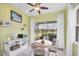 Cozy breakfast nook with views of the lake and outdoor patio at 2025 Lynx Run, North Port, FL 34288