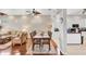 Dining room and living room boasts hardwood floors and views into the bright kitchen at 2025 Lynx Run, North Port, FL 34288