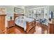 Inviting main bedroom with hardwood floors and a bay window at 2025 Lynx Run, North Port, FL 34288