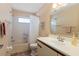 Bathroom featuring a shower, bathtub and tiled floors at 204 Aspen St, Englewood, FL 34223