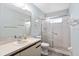 Bathroom featuring a shower, vanity and tiled floors at 204 Aspen St, Englewood, FL 34223
