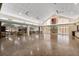 Spacious community center perfect for gatherings, featuring ample seating and an American flag at 204 Aspen St, Englewood, FL 34223