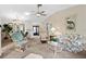 Spacious living room features neutral carpeting and traditional furnishings at 204 Aspen St, Englewood, FL 34223