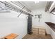 Spacious walk-in closet with metal racks, shelving, and ample storage space at 204 Aspen St, Englewood, FL 34223