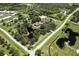 Stunning aerial view showcasing an expansive property with ponds and manicured greenery at 21210 77Th E Ave, Bradenton, FL 34202