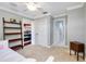 A well-lit bedroom boasts a large closet and access to a full bathroom at 21210 77Th E Ave, Bradenton, FL 34202